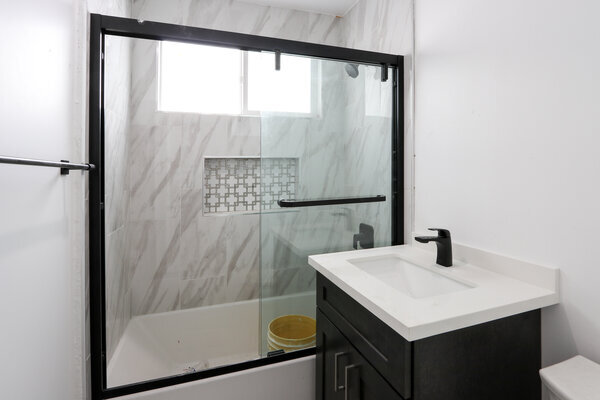 1BR rental in Los Angeles — All New One Bedroom w/ New Appliances | Koreatown, Echo Park, Silver Lake & DTLA | Stone quartz countertops with brand new self-closing cabinetry and high-end stainless-steel refrigerators